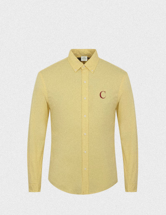 Primrose Yellow solid shirt with embedded maroon logo